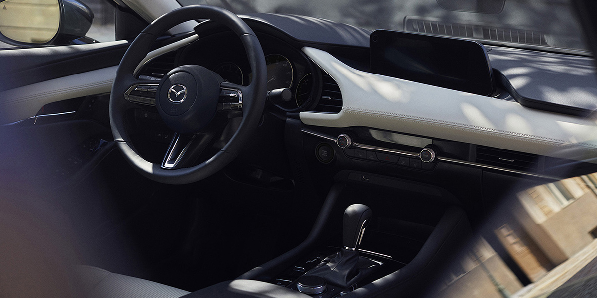 Steering wheel and driver seat of Mazda3 Sedan