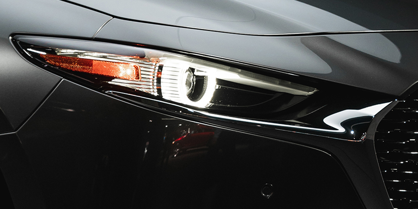 Headlight of a Mazda3 Sedan