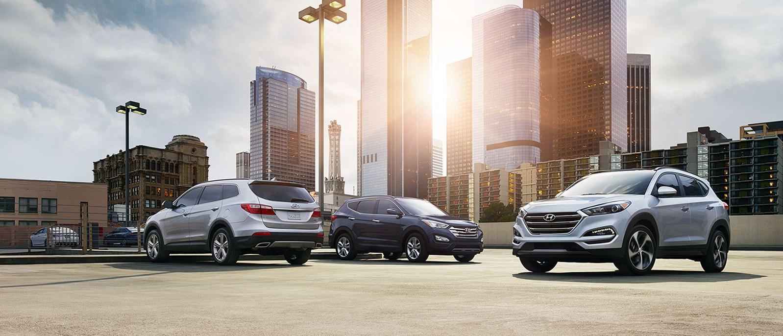 Hyundai 2016 model lineup parked in a downtown parking lot.