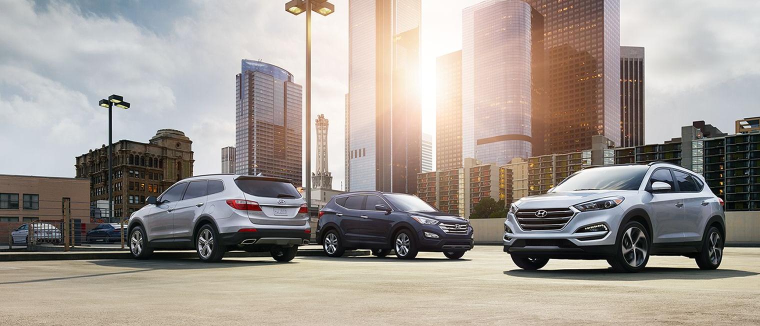 Hyundai 2016 model lineup parked in a downtown parking lot.