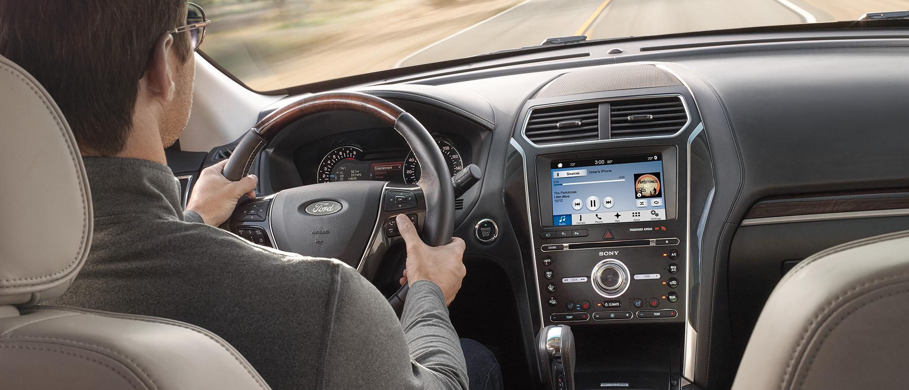 2018 Ford Explorer interior with man driving vehicle