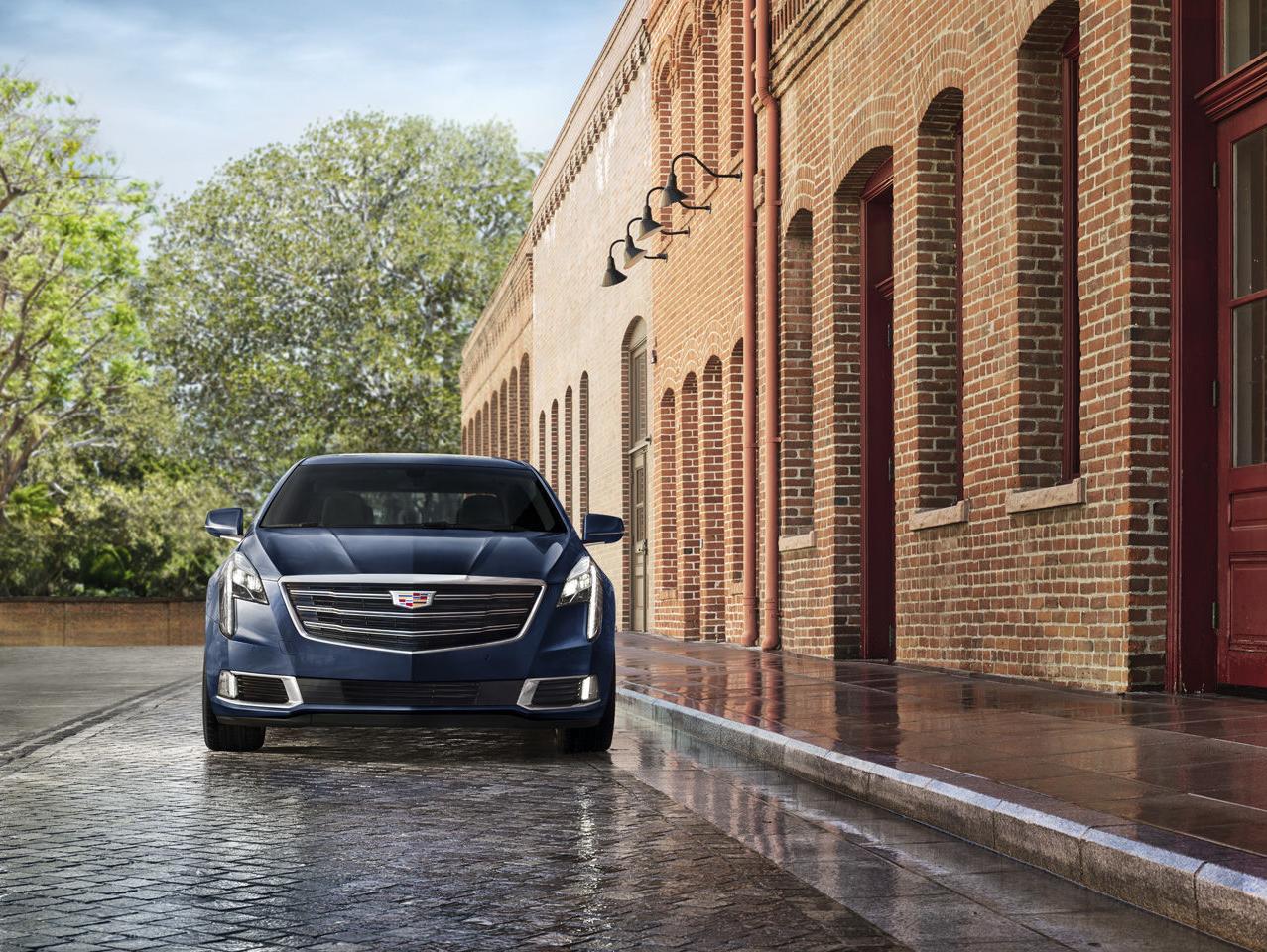 2018 Cadillac XTS | Lifestyle | Brick Building and Tree background