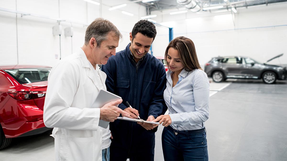 Mazda Technician showing customer report