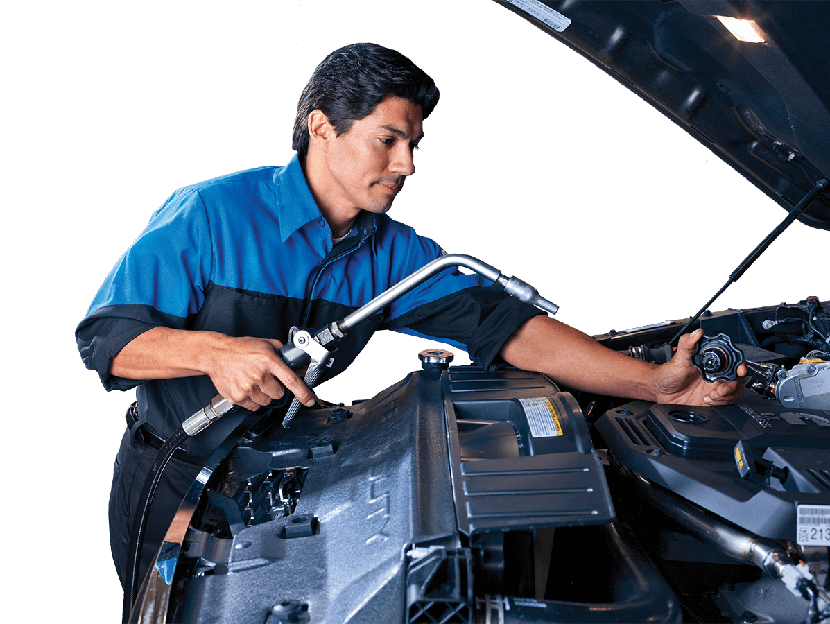 Service technician working under the hood