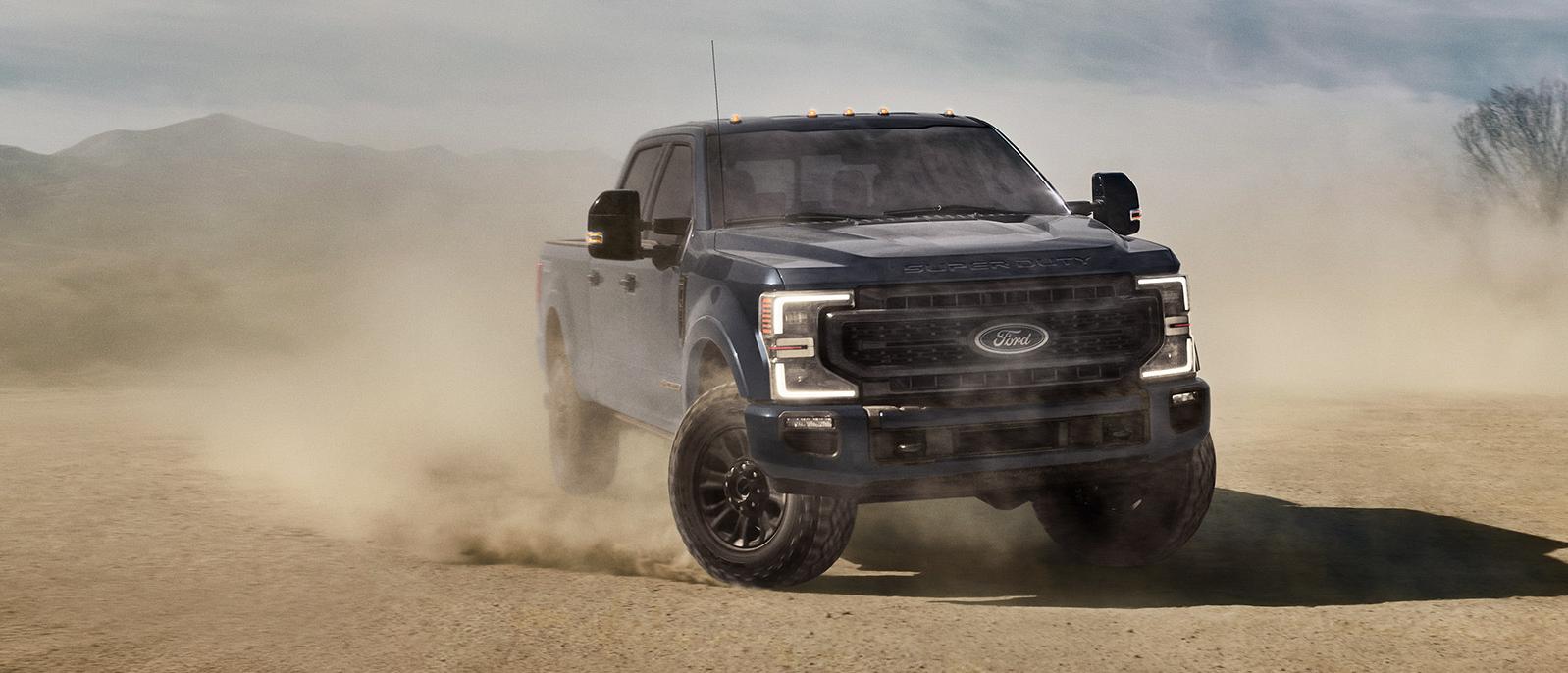 2022 dark blue Ford Super Duty in the desert.