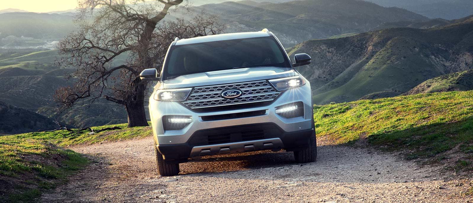 2022 Ford Explorer is parked in mountain range.