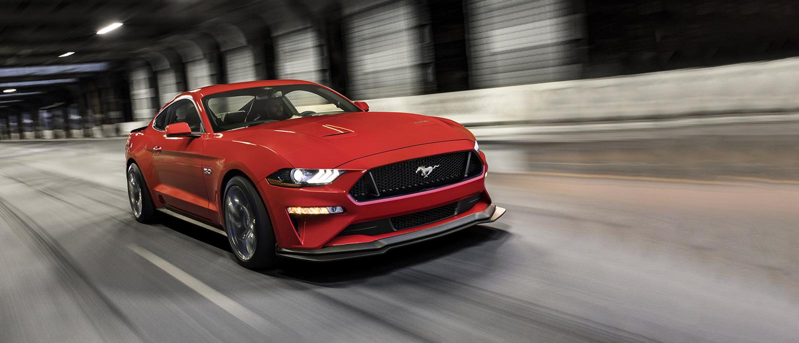 2020 Ford Mustang driving through a tunnel