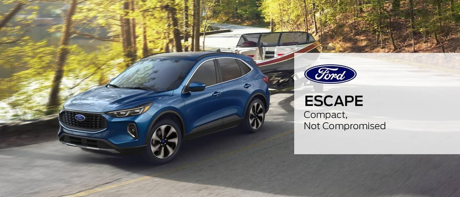 2023 Blue Ford Escape is sprinting on mountain road.