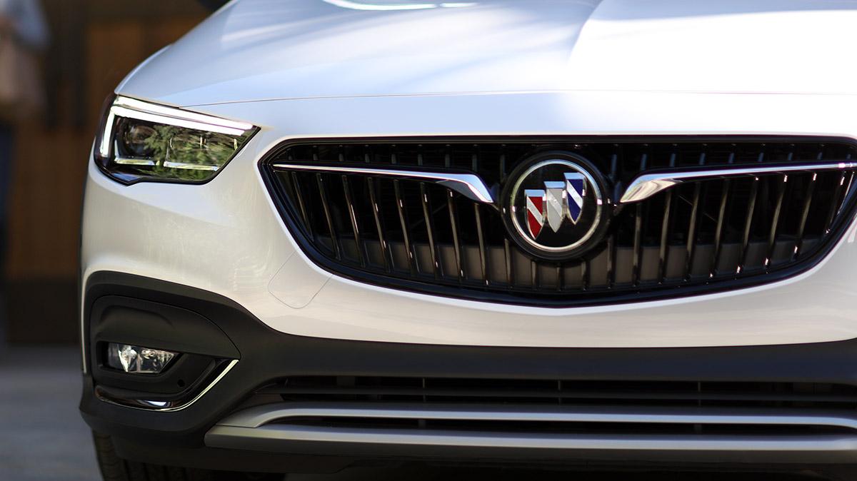 Front grille of a Buick Regal TourX with Buick Logo.