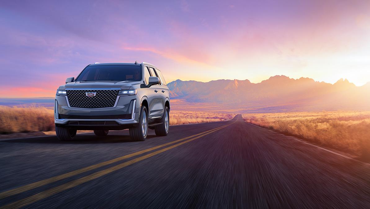 The 2024 Escalade is sprinting on the road.
