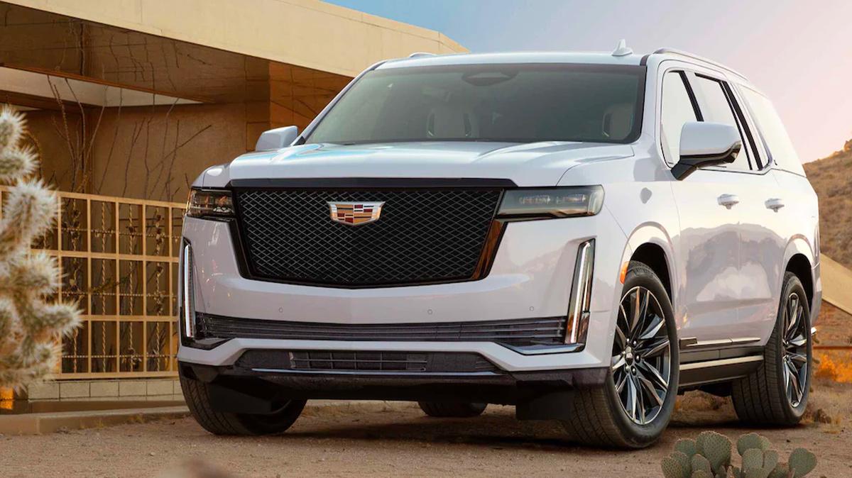 2022 Escalade white front view parked in desert.