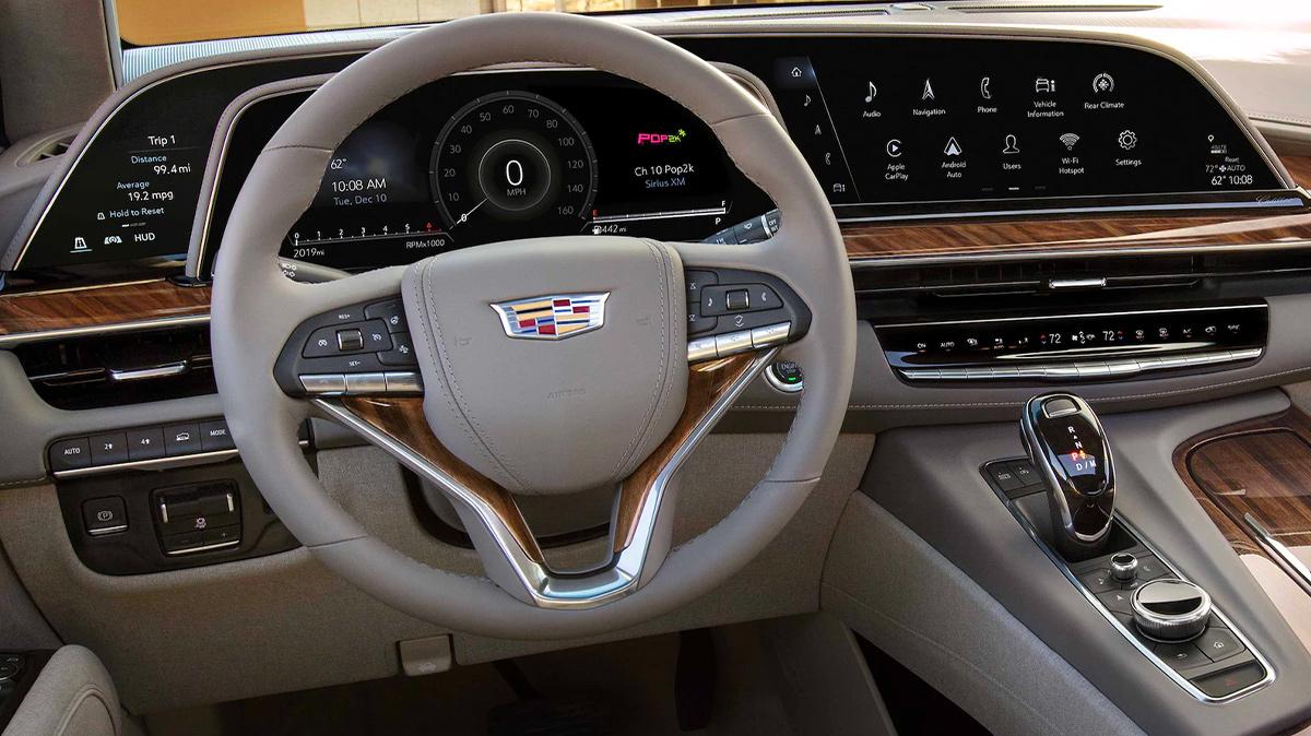 2022 Escalade Interior featuring a curved 38" LED Dashboard. Disclaimer: Certain features shown not available with all configurations.  See dealer for details.