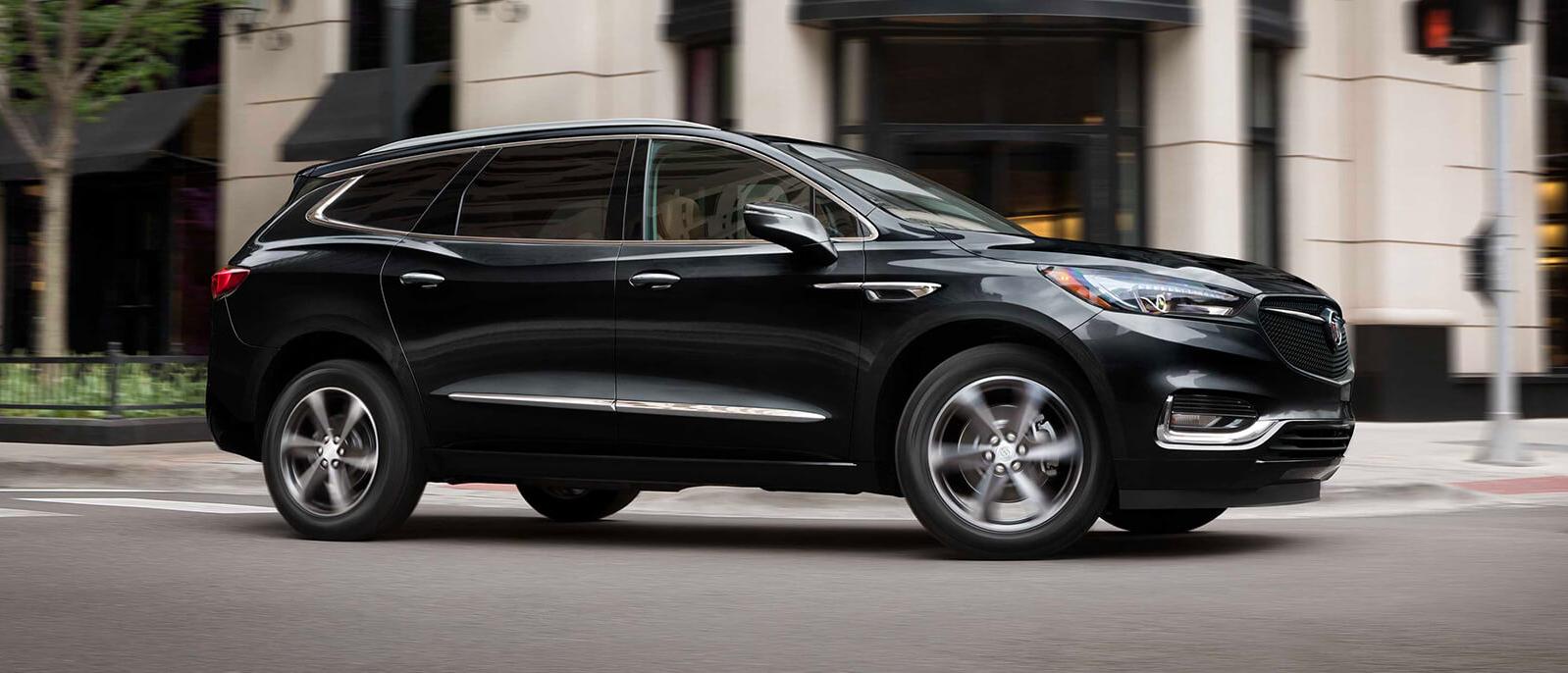 Black 2021 Buick Enclave on a road.