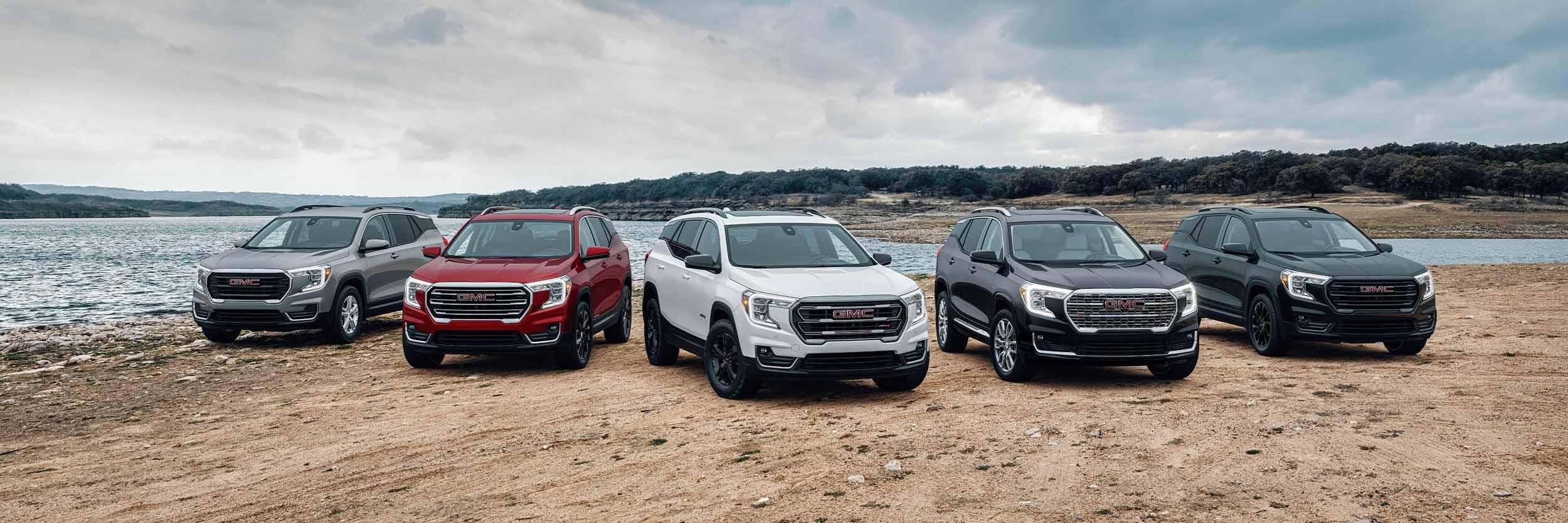 GMC Terrain parked near a river