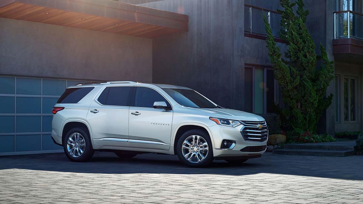 Chevrolet Traverse next to garage