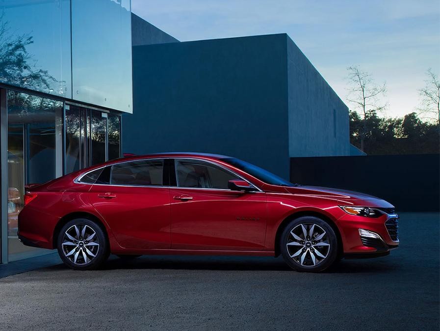 2020 Chevy Malibu parked outside Showroom