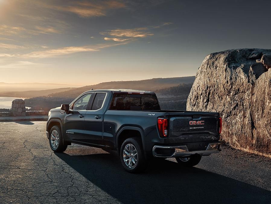 GMC Sierra 1500 with sunset