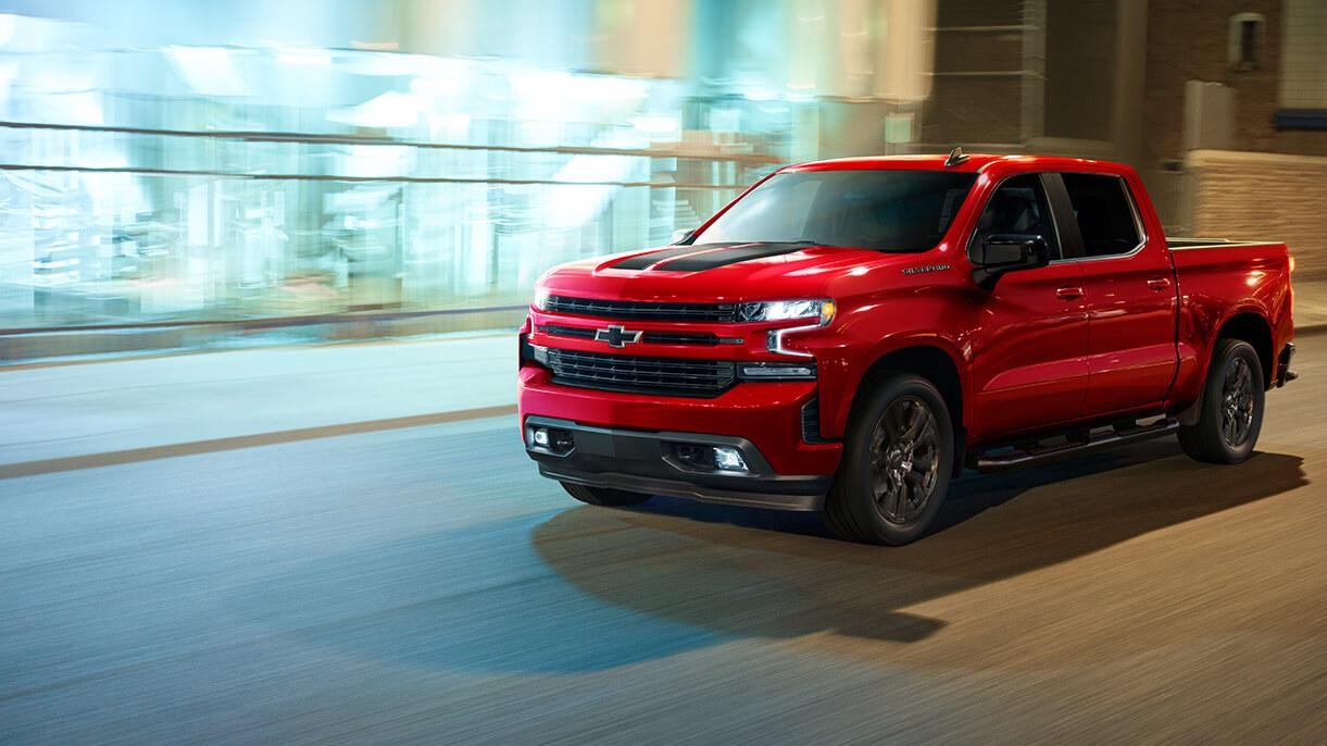 2021 Chevy Silverado 1500 driving through the city.