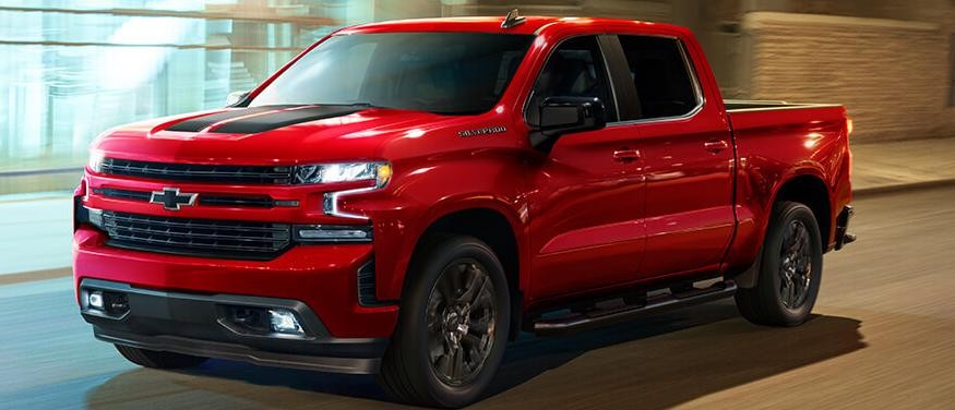 2021 Chevy Silverado 1500 driving through the city.