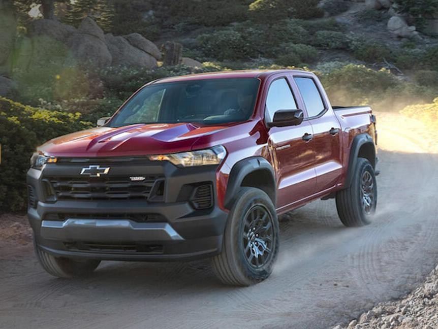 Chevy Colorado driving on road.