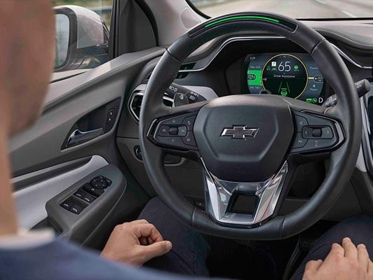 Man with hands off wheel while driving