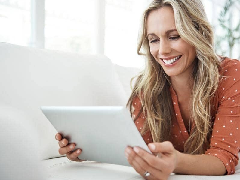 Woman shopping on tablet