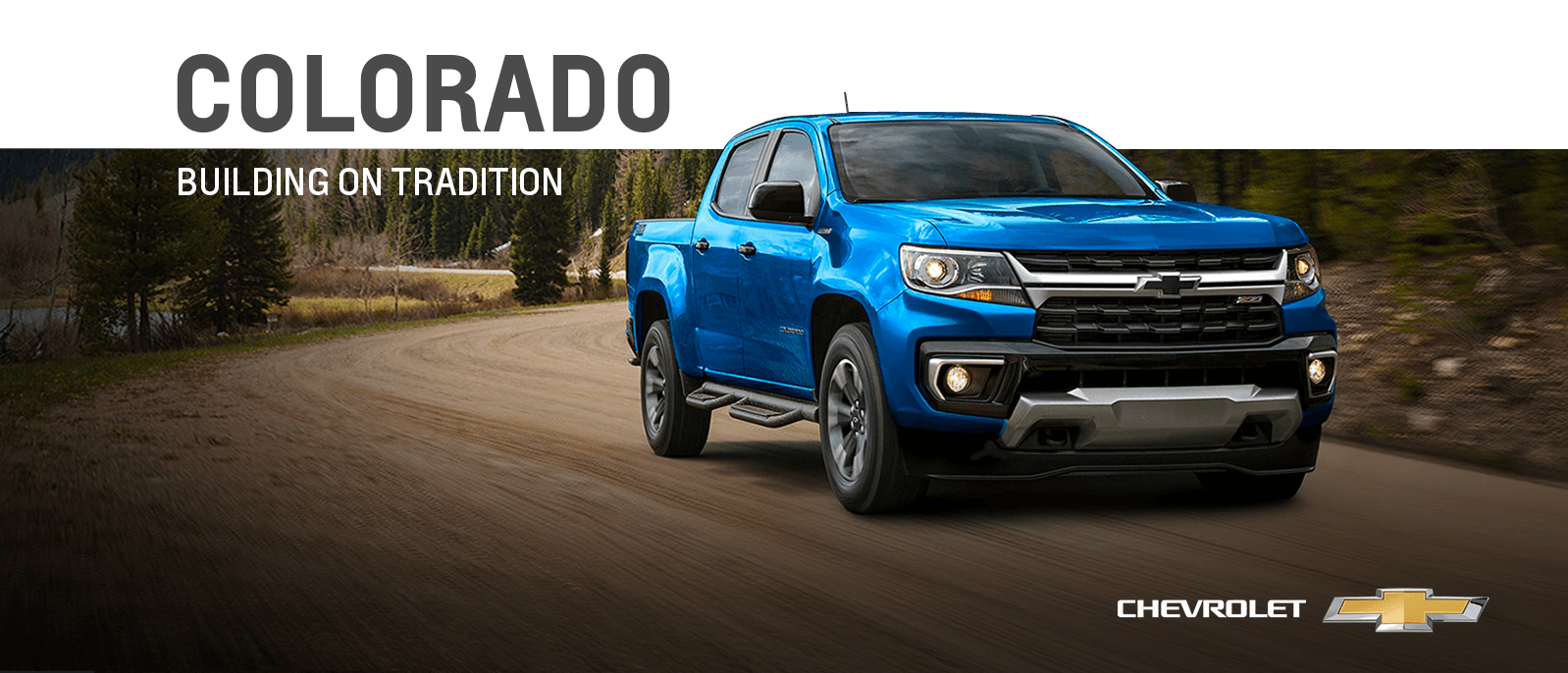 A Blue 2021 chevy Colorado driving on an Offraod. 