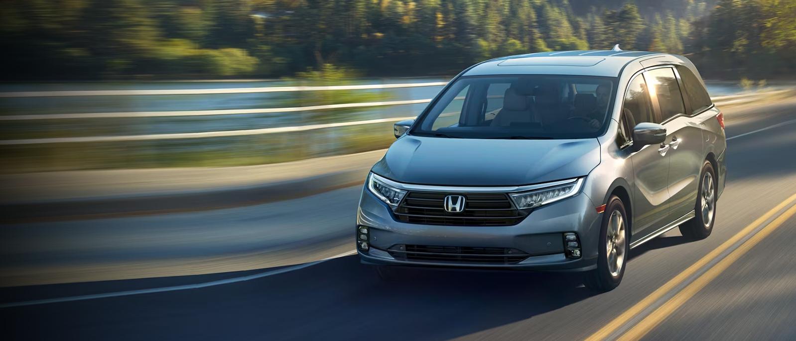 2024 Honda Odyssey driving on the road