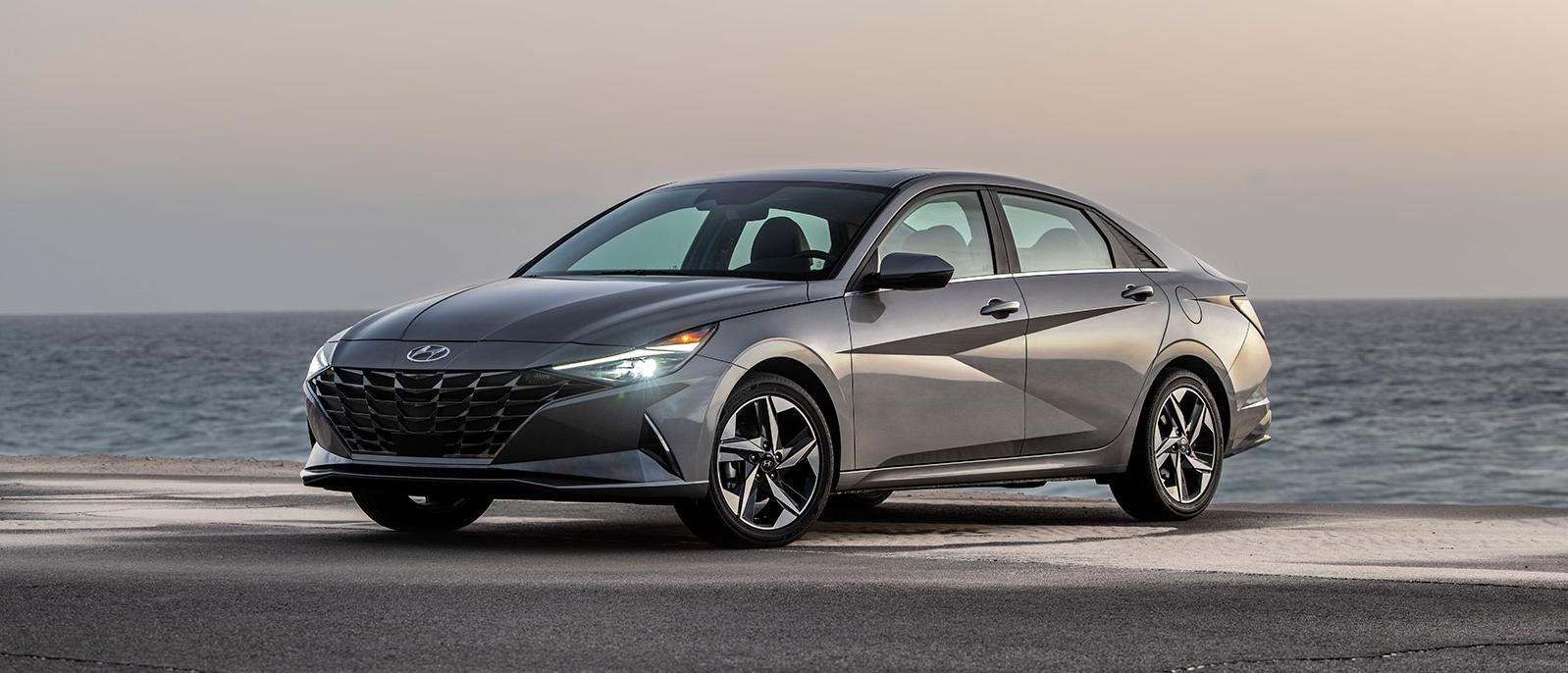 2022 grey Hyundai Elantra parked at beach side.