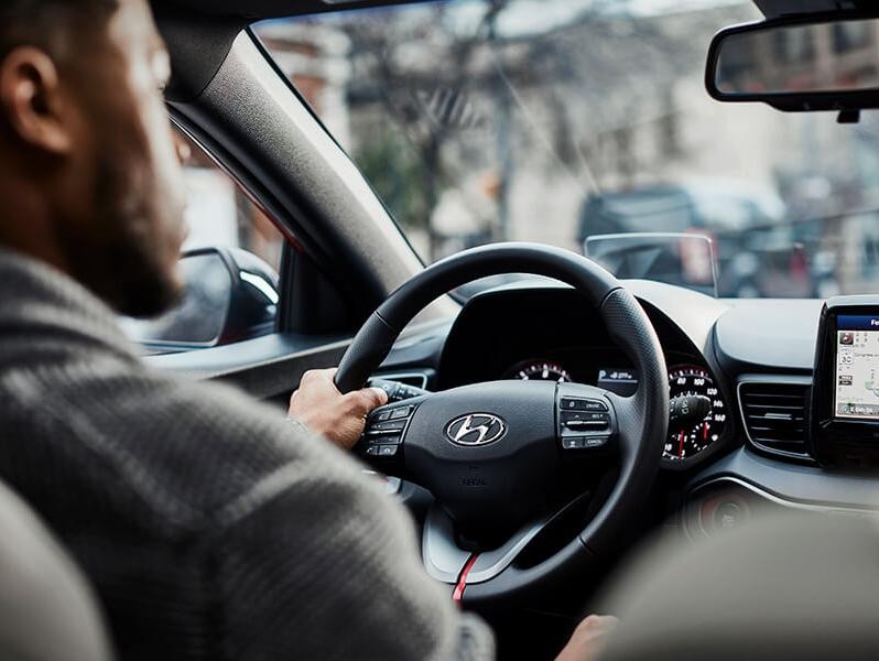 Man driving a 2019 %Hyundai Veloster