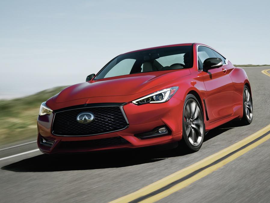 The 2022 INFINITI Q60 red vehicle driving outside on a road