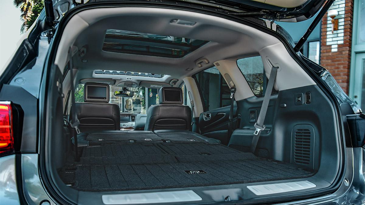 View of the interior of the INFINITI QX60 with the seats folded down.
