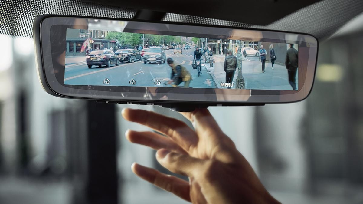 Interior detail of the video rear view mirror in an INFINITI QX80.