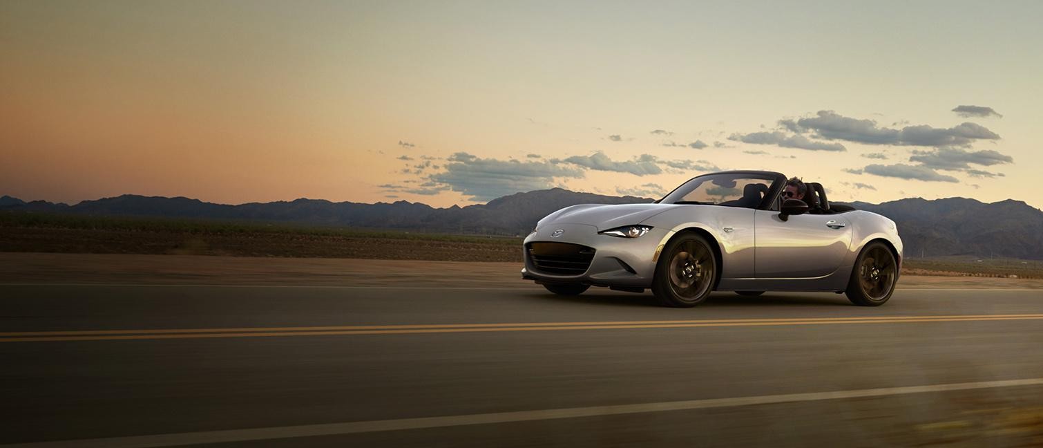 2024 Mazda MX 5 ST running on the road.