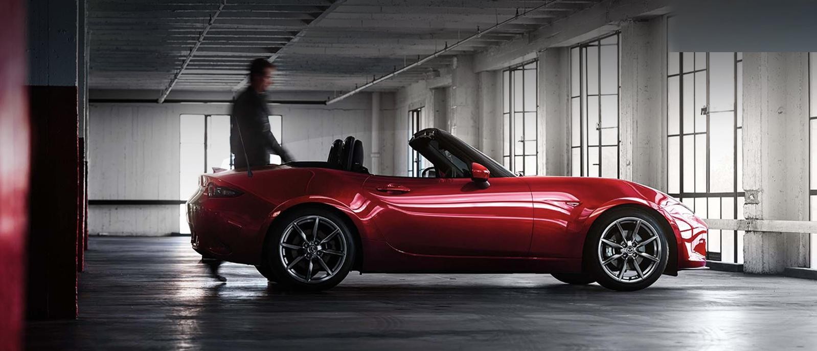 A 2022 Mazda MX-5 Miata parked in a building.