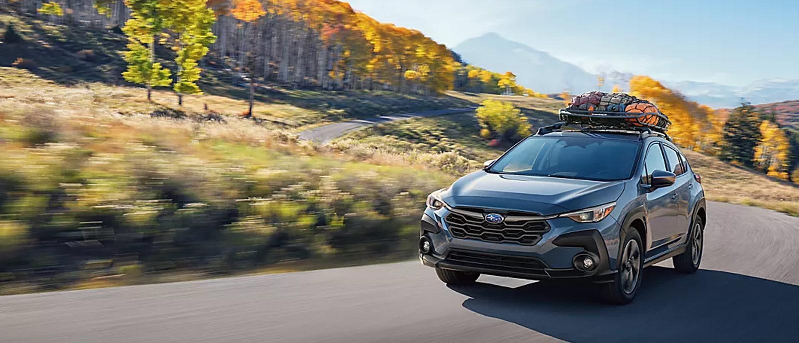 2024 Subaru Crosstrek driving on the road