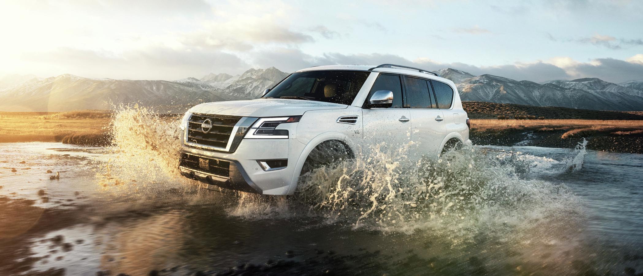 A White 2023 Nissan Armada in water.