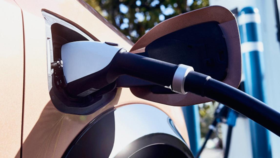 Close-up image of Nissan ARIYA charging port 