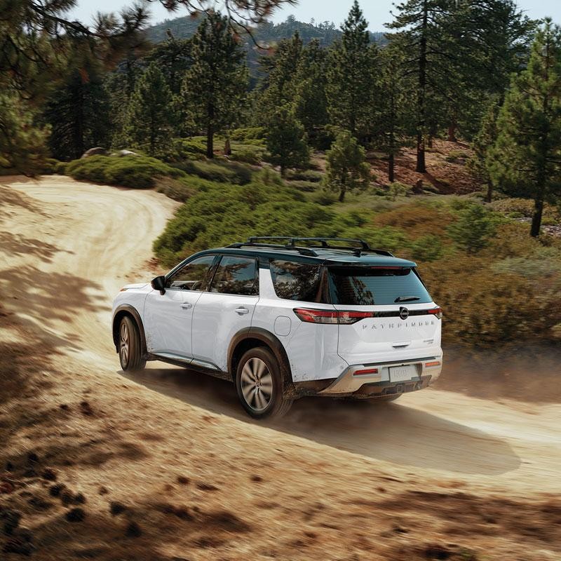 White 2025 Nissan Pathfinder off-roading