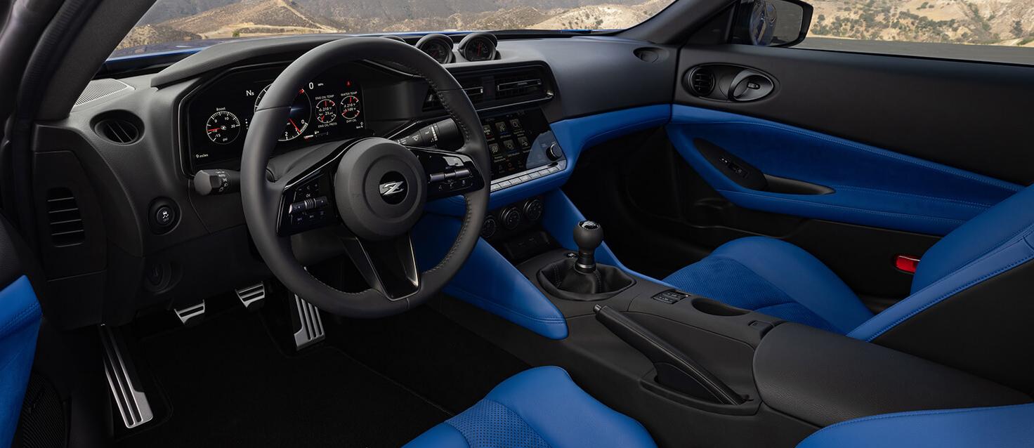 Blue Nissan Z driver and passenger interior