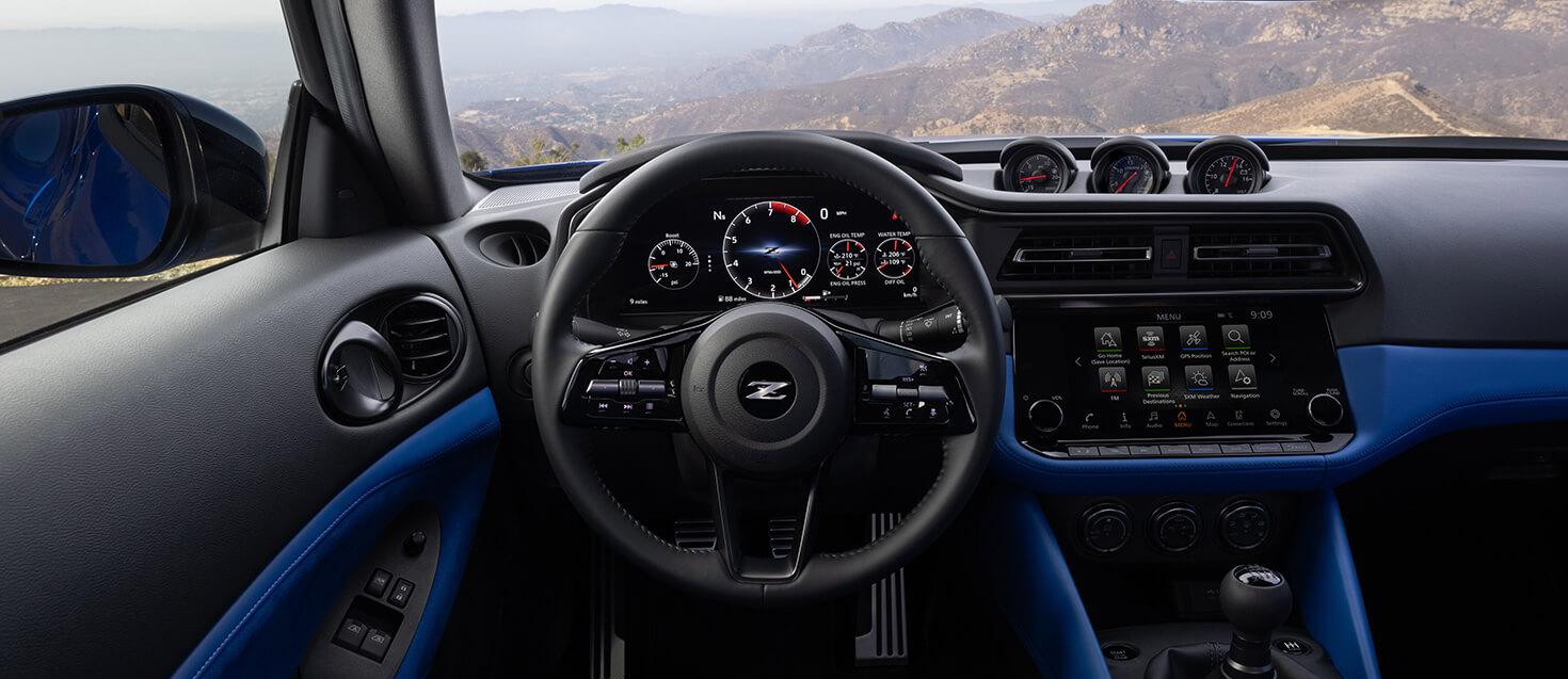 Blue Nissan Z drive side interior controls
