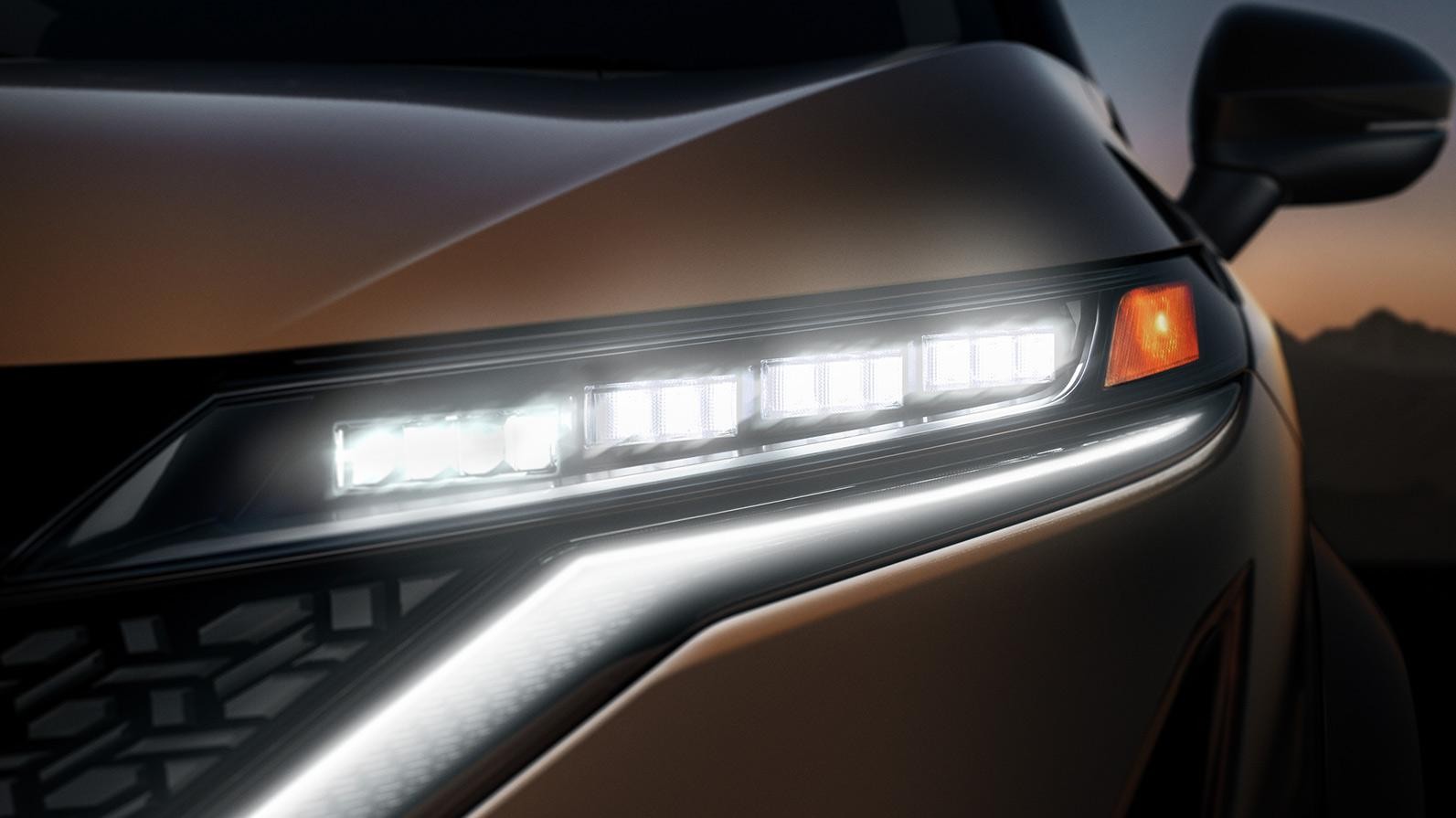 Zoom-in of 2023 Nissan Ariya headlight.