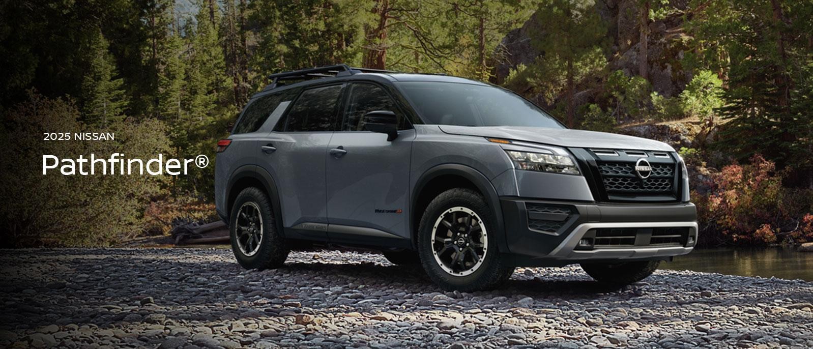 2025 Nissan Pathfinder parked by a river