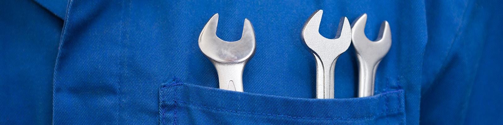 Wrenches in a mechanic's pocket
