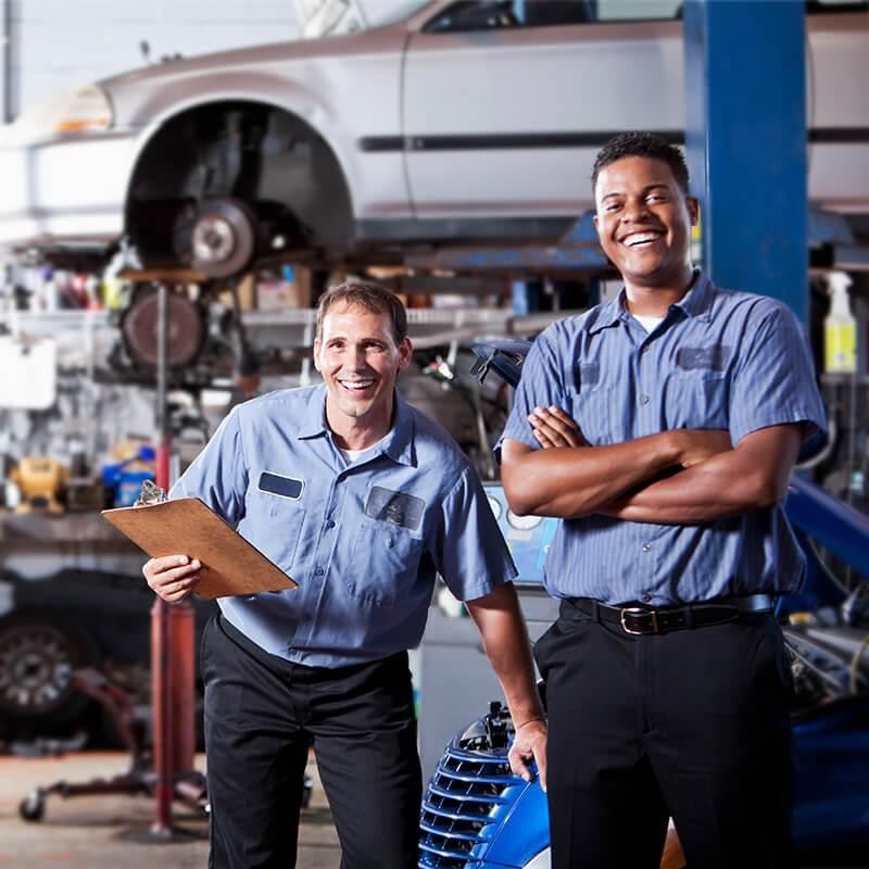 Smiling mechanics in a garage