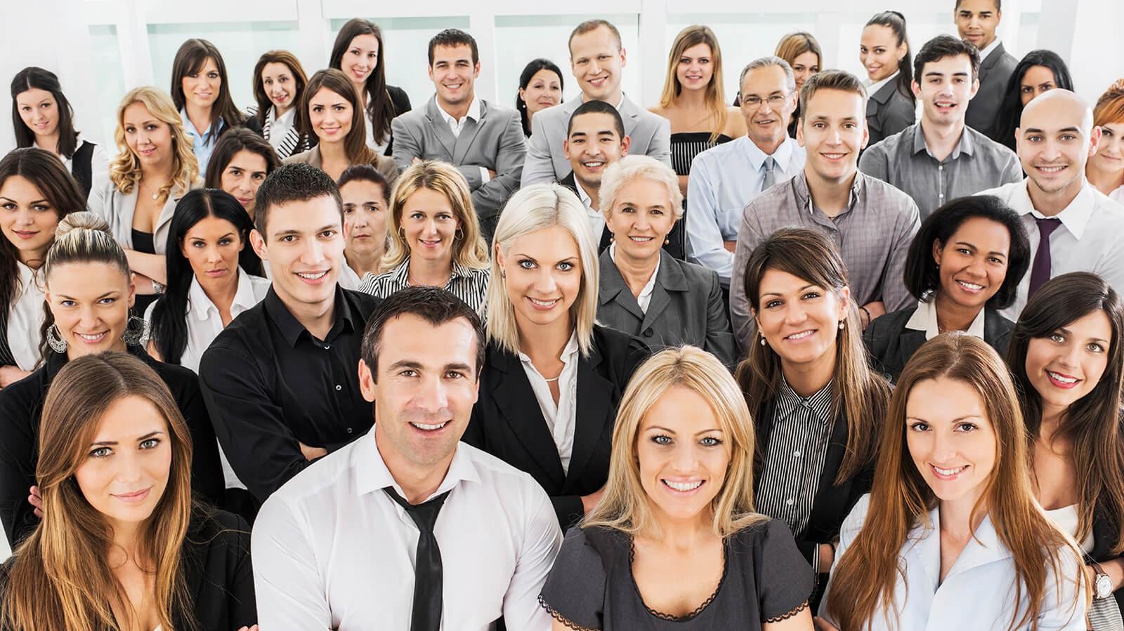 Large group of smiling professionals