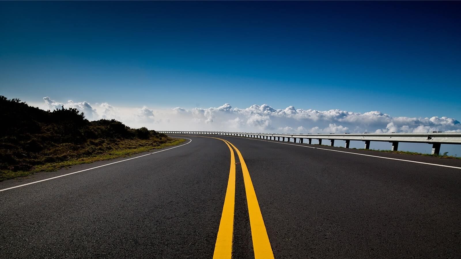 Rural road under a blue sky