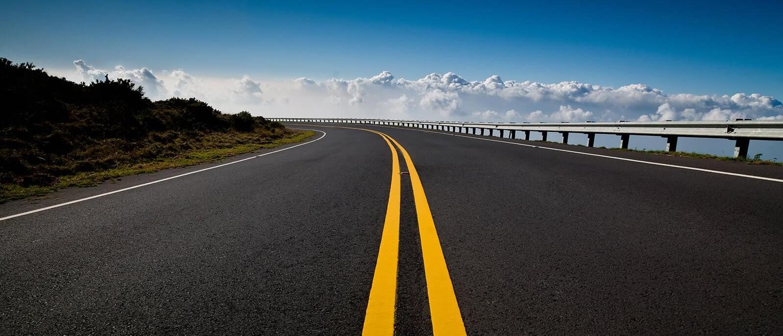 Rural road under a blue sky