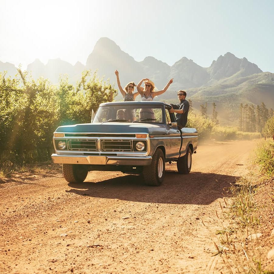 Young friends in a pickup truck