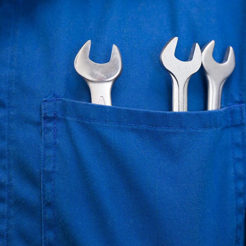 Mechanic's pocket with tools in it